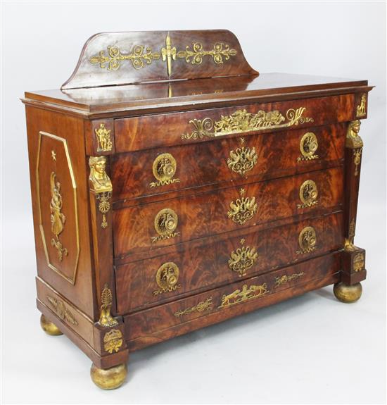 A French Empire ormolu mounted flame mahogany commode, W.4ft 1in. D.1ft 11in. H.3ft 1in.